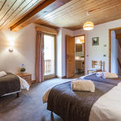 Chalet Foehn's Room 2, generous sized top floor room, easily accommodates 3 and can take 4th bed, with balcony views.