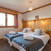 Chalet Foehn, Room 3,  Twin with ensuite shower room on the ground floor.