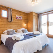 Chalet Les Sauges spacious bedrooms and bright picture windows