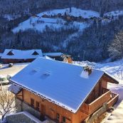 View down on Chalet L'Erine just by the bubble lift
